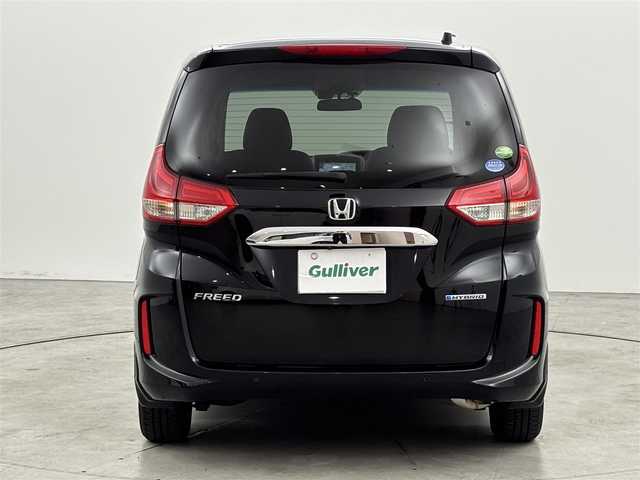 ホンダ フリード ハイブリット G ホンダセンシング 福岡県 2020(令2)年 2.8万km 黒 純正９型ナビ／フルセグＴＶ　/バックカメラ　/ビルトインＥＴＣ　/前方ドラレコ　/レーダークルコン　/コーナーセンサー　/衝突軽減ブレーキ　/レーンキープ　/両側電動スライドドア　/ハーフレザーシート　/シートヒーター　/LEDヘッドライト　/純正１５インチアルミホイール