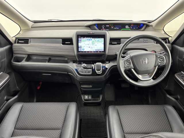 ホンダ フリード ハイブリット G ホンダセンシング 福岡県 2020(令2)年 2.8万km 黒 純正９型ナビ／フルセグＴＶ　/バックカメラ　/ビルトインＥＴＣ　/前方ドラレコ　/レーダークルコン　/コーナーセンサー　/衝突軽減ブレーキ　/レーンキープ　/両側電動スライドドア　/ハーフレザーシート　/シートヒーター　/LEDヘッドライト　/純正１５インチアルミホイール