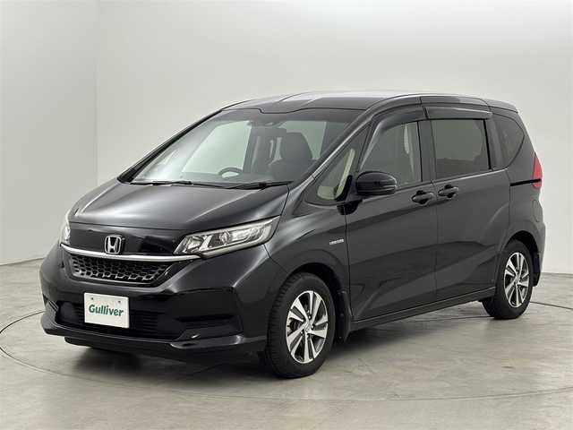 ホンダ フリード ハイブリット G ホンダセンシング 福岡県 2020(令2)年 2.8万km 黒 純正９型ナビ／フルセグＴＶ　/バックカメラ　/ビルトインＥＴＣ　/前方ドラレコ　/レーダークルコン　/コーナーセンサー　/衝突軽減ブレーキ　/レーンキープ　/両側電動スライドドア　/ハーフレザーシート　/シートヒーター　/LEDヘッドライト　/純正１５インチアルミホイール