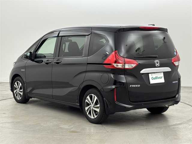 ホンダ フリード ハイブリット G ホンダセンシング 福岡県 2020(令2)年 2.8万km 黒 純正９型ナビ／フルセグＴＶ　/バックカメラ　/ビルトインＥＴＣ　/前方ドラレコ　/レーダークルコン　/コーナーセンサー　/衝突軽減ブレーキ　/レーンキープ　/両側電動スライドドア　/ハーフレザーシート　/シートヒーター　/LEDヘッドライト　/純正１５インチアルミホイール