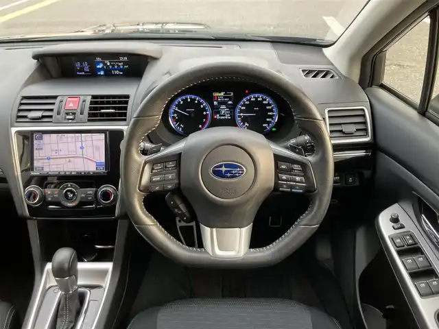 スバル レヴォーグ 1．6GT アイサイト 鳥取県 2014(平26)年 7.3万km クリスタルブラックシリカ ワンオーナー/４WD・ターボ車/社外ナビ/フルセグ/DVD/CD/USB/BT（ハンズフリー）/バックカメラ・ETC/STIスポイラー/フロント/サイド/リア/SI-DRAIVE/アイサイト/レーンキープアシスト/レーダークルーズコントロール/キセノンライト/フォグライト/純正17インチアルミホイール/プッシュエンジンスタート/スマートキー×２/アイドリングストップ/フロアマット/ドアバイザー/保証書・取扱説明書