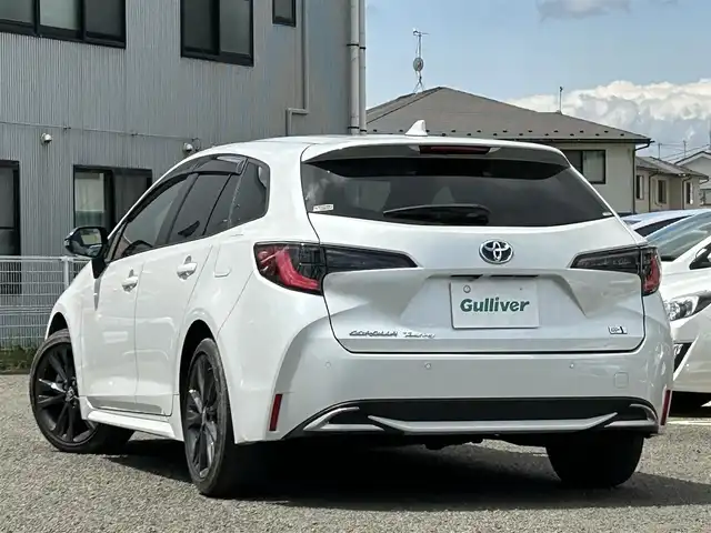 トヨタ カローラツーリング ハイブリッド ダブルバイビー 宮城県 2022(令4)年 5.5万km プラチナホワイトパールマイカ 純正メモリナビ/フルセグTV/AM/FM/Bluetooth/ブラインドスポットモニター/レーダークルーズコントロール/横滑り防止装置/プロアクティブドライビングアシスト/レーンキープアシスト/オートハイビーム/ハンドルヒーター/D/N席シートヒーター/バックカメラ/プッシュスタート/ビルトインETC/純正フロアマット/スマートキー/純正サマータイヤ