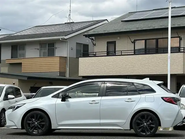 トヨタ カローラツーリング ハイブリッド ダブルバイビー 宮城県 2022(令4)年 5.5万km プラチナホワイトパールマイカ 純正メモリナビ/フルセグTV/AM/FM/Bluetooth/ブラインドスポットモニター/レーダークルーズコントロール/横滑り防止装置/プロアクティブドライビングアシスト/レーンキープアシスト/オートハイビーム/ハンドルヒーター/D/N席シートヒーター/バックカメラ/プッシュスタート/ビルトインETC/純正フロアマット/スマートキー/純正サマータイヤ