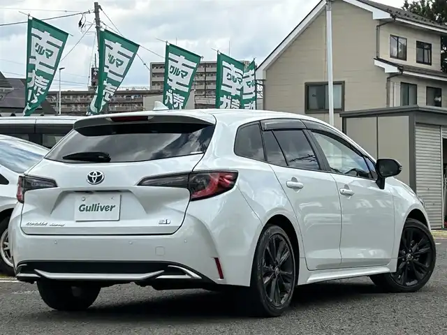 トヨタ カローラツーリング ハイブリッド ダブルバイビー 宮城県 2022(令4)年 5.5万km プラチナホワイトパールマイカ 純正メモリナビ/フルセグTV/AM/FM/Bluetooth/ブラインドスポットモニター/レーダークルーズコントロール/横滑り防止装置/プロアクティブドライビングアシスト/レーンキープアシスト/オートハイビーム/ハンドルヒーター/D/N席シートヒーター/バックカメラ/プッシュスタート/ビルトインETC/純正フロアマット/スマートキー/純正サマータイヤ