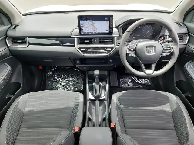ホンダ ＷＲ－Ｖ Z+ 東京都 2024(令6)年 0.1万km未満 プラチナホワイトパール 登録済未使用車/純正9インチナビ/フルセグ/バックカメラ/パドルシフト/スマートキー/LEDヘッドライト/ホンダセンシング/衝突軽減ブレーキ/路外逸脱抑制機能/車線維持支援システム/アダプティブクルーズコントロール/オートハイビーム