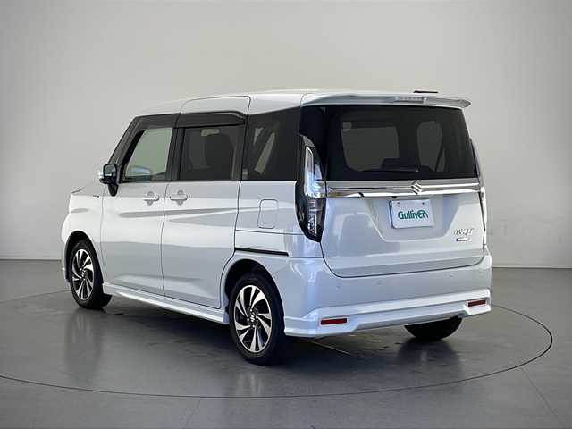 スズキ ソリオ バンディット HV MV 長野県 2022(令4)年 3.1万km ピュアホワイトP 4WD/純正SDナビ/Bluetooth／CD／DVD／フルセグTV/全方位カメラ/ビルトインETC2.0/純正前後ドラレコ/後席モニター（アルパイン）/前席シートヒーター/横滑り防止装置/衝突被害軽減システム/レーンキープアシスト/純正15インチAW装着/純正フロアマット/純正ドアバイザー/前後コーナーセンサー/両側パワスラ/クルーズコントロール（追従走行有）/LEDヘッドライト/スマートキー