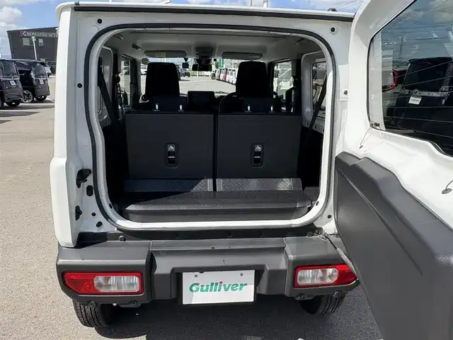 スズキ ジムニー XC 徳島県 2024(令6)年 1.8万km ピュアホワイトP 4WD/ICターボ/7インチメモリナビ/（Bluetooth/CD）/バックカメラ/シートヒーター（D+N席）/クルーズコントロール/クリアランスソナー/LEDヘッドライト/オートハイビーム/オートライト/ドライブレコーダー/純正16AW/ヘッドライトウォッシャー/アイドリングストップ/スペアキー