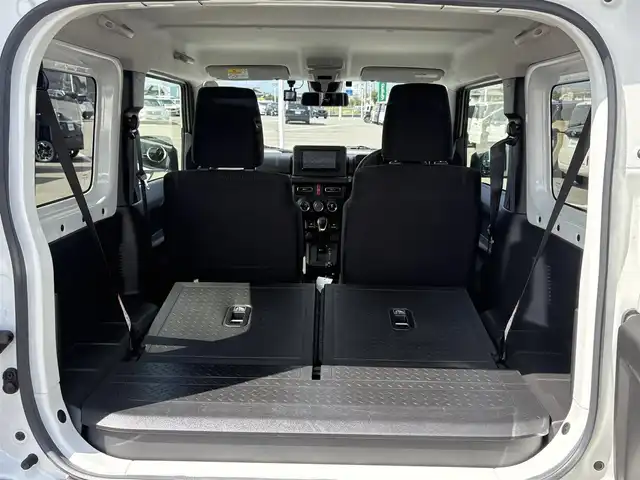 スズキ ジムニー XC 徳島県 2024(令6)年 1.8万km ピュアホワイトP 4WD/ICターボ/7インチメモリナビ/（Bluetooth/CD）/バックカメラ/シートヒーター（D+N席）/クルーズコントロール/クリアランスソナー/LEDヘッドライト/オートハイビーム/オートライト/ドライブレコーダー/純正16AW/ヘッドライトウォッシャー/アイドリングストップ/スペアキー