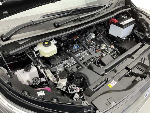 トヨタ ヴォクシー ハイブリッド S－Z 滋賀県 2024(令6)年 0.1万km未満 アティチュードブラックマイカ 禁煙車/純正10.5型ナビ/（CD/DVD/Bluetooth/USB/Apple Car Play/Android Auto/Miracast/フルセグTV)/パノラミックビューモニター/ビルトインETC2.0/両側パワースライドドア/ハーフレザーシート/1列目シートヒーター/AC100V電源（1500W）/アドバンストパーク/BSM/LEDヘッドライト/オートライト/トヨタセーフティセンス/　・オートハイビーム/　・レーントレーシングアシスト/　・プリクラッシュセーフティ/　・レーダークルーズコントロール/クリアランスソナー/ロードサインアシスト/先行車発進告知機能/電動パーキングブレーキ/オートブレーキホールド/プッシュスタート/スマートキー/スペアキー