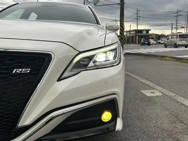 トヨタ クラウン ハイブリッド RS 神奈川県 2019(令1)年 6.5万km ホワイトパールクリスタルシャイン 純正メモリナビ/前後ドライブレコーダー/ETC２．０/トヨタセーフティシステム/バックカメラ/フォグライト/パドルシフト/ウィンカーミラー/クルーズコントロール/プッシュスタート/ステアリングスイッチ/全席パワーシート/スペアキー/LEDヘッドライト/スマートキー