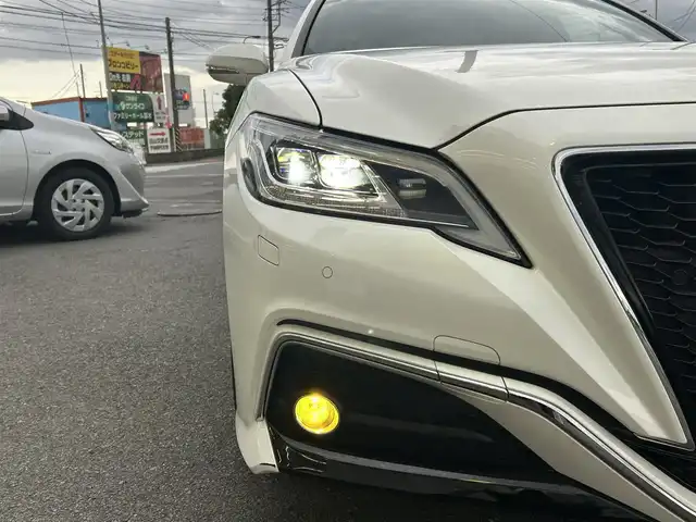 トヨタ クラウン ハイブリッド RS 神奈川県 2019(令1)年 6.5万km ホワイトパールクリスタルシャイン 純正メモリナビ/前後ドライブレコーダー/ETC２．０/トヨタセーフティシステム/バックカメラ/フォグライト/パドルシフト/ウィンカーミラー/クルーズコントロール/プッシュスタート/ステアリングスイッチ/全席パワーシート/スペアキー/LEDヘッドライト/スマートキー
