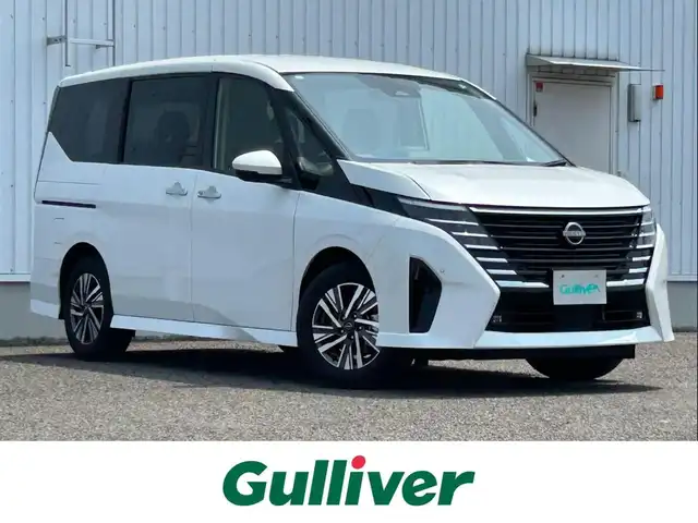 日産 セレナ e－パワー ハイウェイスター V 熊本県 2023(令5)年 0.6万km プリズムホワイト 純正SDナビ/・AM/FM/SD/BT/・フルセグTV/全周囲カメラ/・バック/サイド/フロント/インテリジェントクルーズコントロール/ハンドル支援/プロパイロット/車線逸脱防止支援システム/車線逸脱警報/ふらつき警報/先行車発進お知らせ機能/後側方車両検知警報/踏み間違い衝突防止アシスト/後退時車両検知警報/標識検知機能/速度標識検知機能/オートマチックハイビーム/インテリジェントルームミラー/前後コーナーセンサー/革巻きステアリング/・ステアリングリモコン/電動格納ミラー/・ウィンカーミラー/オートライト/・LEDライト/・フォグランプ/・ヘッドライトレベライザー/電動サイドブレーキ/・オートホールドボタン/純正フロアマット/純正アルミホイール/スマートキー/・スペアキー