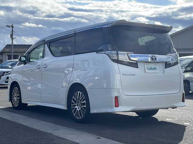 トヨタ ヴェルファイア Z Gエディション 香川県 2016(平28)年 7.6万km ホワイトパールクリスタルシャイン メーカーOP9.2型TFTワイドタッチディスプレイ/JBLサウンド/フルセグテレビ/後席モニター/全方位パノラミックビューモニター/ステアリングヒーター/両側パワースライドドア/モデリスタフロントエアロ/サンルーフ/電動リアゲート/レザーシート/前後コーナーセンサー/ETC
