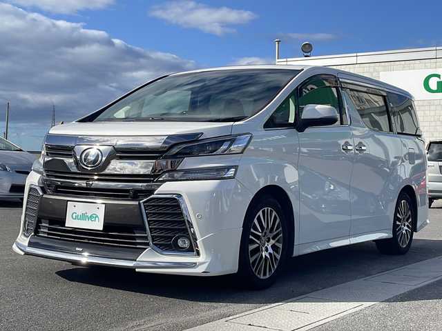 トヨタ ヴェルファイア Z Gエディション 香川県 2016(平28)年 7.6万km ホワイトパールクリスタルシャイン メーカーOP9.2型TFTワイドタッチディスプレイ/JBLサウンド/フルセグテレビ/後席モニター/全方位パノラミックビューモニター/ステアリングヒーター/両側パワースライドドア/モデリスタフロントエアロ/サンルーフ/電動リアゲート/レザーシート/前後コーナーセンサー/ETC