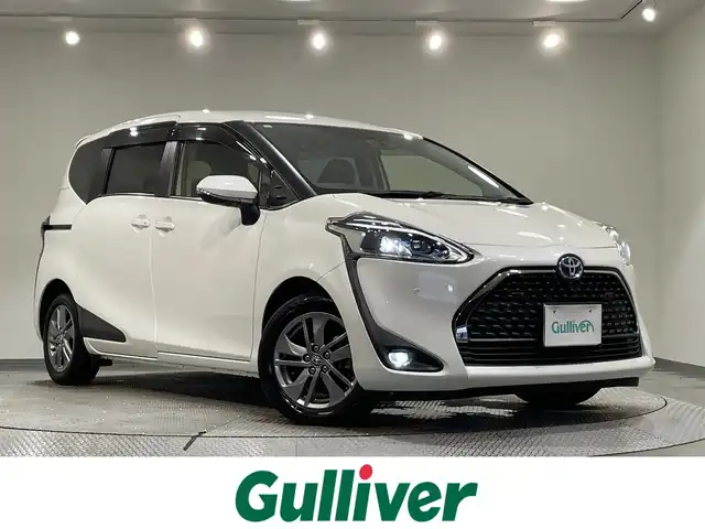 トヨタ シエンタ ハイブリッド G クエロ 愛知県 2022(令4)年 4.9万km ホワイトパールクリスタルシャイン 純正9インチナビ/（Bluetooth/AM/FM/フルセグTV）/フリップダウンモニター/衝突軽減ブレーキ/両側電動スライドドア/アラウンドビューモニター/ビルトインETC2.0/シートヒーター/クルーズコントロール/ドライブレコーダー/ステアリングヒーター/コーナーセンサー/レーンキープアシスト/スマートキー/スペアキー有/純正15インチAW/ハーフレザーシート