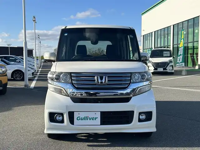 ホンダ Ｎ ＢＯＸ カスタム SSパッケージ 奈良県 2015(平27)年 5.8万km プレミアムホワイトパール 純正ナビ(VXM-145VSi)/（ワンセグ/BT/CD/DVD）/バックカメラ/横滑り防止/アイドリングストップ/両側パワースライドドア/オートライト/電動格納ミラー/プッシュスタート/純正14インチAW