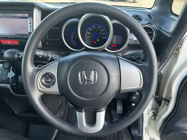 ホンダ Ｎ ＢＯＸ カスタム SSパッケージ 奈良県 2015(平27)年 5.8万km プレミアムホワイトパール 純正ナビ(VXM-145VSi)/（ワンセグ/BT/CD/DVD）/バックカメラ/横滑り防止/アイドリングストップ/両側パワースライドドア/オートライト/電動格納ミラー/プッシュスタート/純正14インチAW