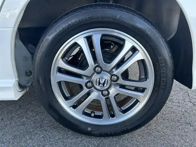 ホンダ Ｎ ＢＯＸ カスタム SSパッケージ 奈良県 2015(平27)年 5.8万km プレミアムホワイトパール 純正ナビ(VXM-145VSi)/（ワンセグ/BT/CD/DVD）/バックカメラ/横滑り防止/アイドリングストップ/両側パワースライドドア/オートライト/電動格納ミラー/プッシュスタート/純正14インチAW