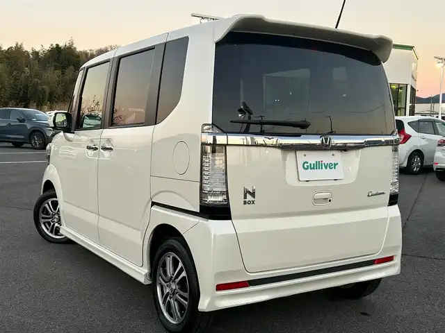 ホンダ Ｎ ＢＯＸ カスタム SSパッケージ 奈良県 2015(平27)年 5.8万km プレミアムホワイトパール 純正ナビ(VXM-145VSi)/（ワンセグ/BT/CD/DVD）/バックカメラ/横滑り防止/アイドリングストップ/両側パワースライドドア/オートライト/電動格納ミラー/プッシュスタート/純正14インチAW