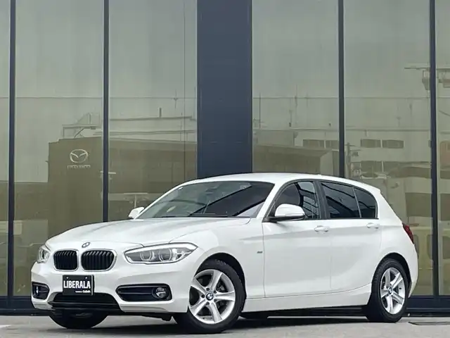 ＢＭＷ １１８ｄ スポーツ 石川県 2017(平29)年 7.3万km 白 コンフォートアクセス/インテリジェントセーフティ/純正ナビ/クルーズコントロール/バックカメラ/Bluetooth/CD/DVD/インナーミラー型ETC/前後ドライブレコーダー（KENWOOD）/車線逸脱警告/衝突軽減ブレーキ/後方クリアランスソナー/LEDヘッドライト/オートライト/スマートキー/プッシュスタート/アイドリングストップ