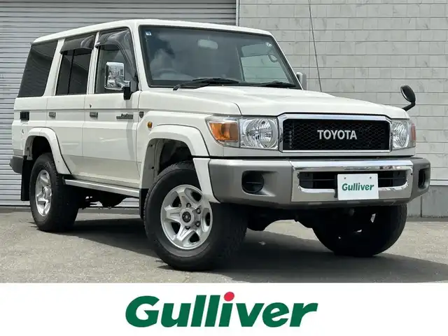 トヨタ ランドクルーザー 道東・釧路十勝 2014(平26)年 6.5万km ホワイト ワンオーナー/4WD/社外ナビ/(AM FM BT TV CD DVD)/ETC/純正フロントグリル/デフロック/背面タイヤ積込/ブラケット積込/冬タイヤ4本積込/5速マニュアル/ドアバイザー/フロアマット/イベライザー