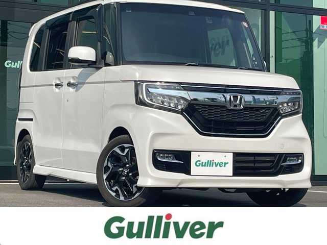 ホンダ Ｎ ＢＯＸ カスタム G EX ターボ ホンダセンシング 愛媛県 2018(平30)年 4万km プラチナホワイトパール ホンダセンシング/アダプティブクルーズコントロール/衝突被害軽減ブレーキ/車線逸脱警報/前後誤発進抑制機能/バックセンサー/ロードサインアシスト/純正8インチナビ【VXU-185NBi 】/　CD/DVD/Bluetooth/フルセグTV/ガイドライン付きバックカメラ/ビルトインETC/前方ドライブレコーダー/両側パワースライドドア/ハーフレザーシート/オートライト/LEDヘッドライト/フロントフォグライト/革巻きステアリング/ステアリングスイッチ/パドルシフト/リアサンシェード/フロアマット/プッシュスタート