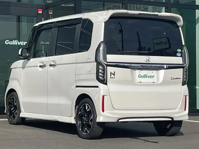 ホンダ Ｎ ＢＯＸ カスタム G EX ターボ ホンダセンシング 愛媛県 2018(平30)年 4万km プラチナホワイトパール ホンダセンシング/アダプティブクルーズコントロール/衝突被害軽減ブレーキ/車線逸脱警報/前後誤発進抑制機能/バックセンサー/ロードサインアシスト/純正8インチナビ【VXU-185NBi 】/　CD/DVD/Bluetooth/フルセグTV/ガイドライン付きバックカメラ/ビルトインETC/前方ドライブレコーダー/両側パワースライドドア/ハーフレザーシート/オートライト/LEDヘッドライト/フロントフォグライト/革巻きステアリング/ステアリングスイッチ/パドルシフト/リアサンシェード/フロアマット/プッシュスタート