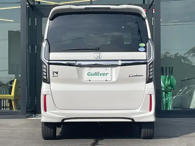 ホンダ Ｎ ＢＯＸ カスタム G EX ターボ ホンダセンシング 愛媛県 2018(平30)年 4万km プラチナホワイトパール ホンダセンシング/アダプティブクルーズコントロール/衝突被害軽減ブレーキ/車線逸脱警報/前後誤発進抑制機能/バックセンサー/ロードサインアシスト/純正8インチナビ【VXU-185NBi 】/　CD/DVD/Bluetooth/フルセグTV/ガイドライン付きバックカメラ/ビルトインETC/前方ドライブレコーダー/両側パワースライドドア/ハーフレザーシート/オートライト/LEDヘッドライト/フロントフォグライト/革巻きステアリング/ステアリングスイッチ/パドルシフト/リアサンシェード/フロアマット/プッシュスタート