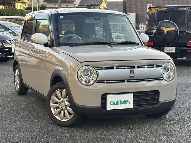 スズキ ラパン X 熊本県 2019(平31)年 7.1万km フォーンベージュメタリック/ホワイト2トーンルーフ ワンオーナー/レーダーブレーキサポート/プッシュスタート/社外ナビ/（CD・DVD・フルセグTV・BTオーディオ・SD）/ETC/純正14インチAW/右前席シートヒーター/HIDヘッドライト/オートライト/横滑り防止装置/ウィンカーミラー/純正フロアマット/純正ドアバイザー/新車保証書/取扱説明書/スマートスペアキー×1本