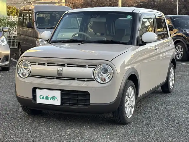 スズキ ラパン X 熊本県 2019(平31)年 7.1万km フォーンベージュメタリック/ホワイト2トーンルーフ ワンオーナー/レーダーブレーキサポート/プッシュスタート/社外ナビ/（CD・DVD・フルセグTV・BTオーディオ・SD）/ETC/純正14インチAW/右前席シートヒーター/HIDヘッドライト/オートライト/横滑り防止装置/ウィンカーミラー/純正フロアマット/純正ドアバイザー/新車保証書/取扱説明書/スマートスペアキー×1本