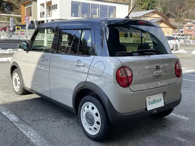 スズキ ラパン ＬＣ X 岐阜県 2025(令7)年 0.2万km フォーンベージュメタリック/アーバンブラウン 2トーン ワンオーナー/4WD/純正ディスプレイオーディオ/【Bluetooth．USB.AM/FM】/ハーフレザーシート/シートヒーター/コーナーセンサー/レーンキープアシスト/衝突被害軽減システム/バックカメラ/ドライブレコーダー/ETC/純正フロアマット/横滑り防止装置/ウィンカーミラー/ドアバイザー/スマートキー/保証書/取扱説明書/スペアキー