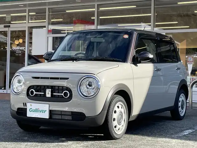 スズキ ラパン ＬＣ X 岐阜県 2025(令7)年 0.2万km フォーンベージュメタリック/アーバンブラウン 2トーン ワンオーナー/4WD/純正ディスプレイオーディオ/【Bluetooth．USB.AM/FM】/ハーフレザーシート/シートヒーター/コーナーセンサー/レーンキープアシスト/衝突被害軽減システム/バックカメラ/ドライブレコーダー/ETC/純正フロアマット/横滑り防止装置/ウィンカーミラー/ドアバイザー/スマートキー/保証書/取扱説明書/スペアキー