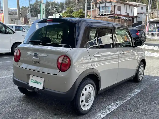 スズキ ラパン ＬＣ X 岐阜県 2025(令7)年 0.2万km フォーンベージュメタリック/アーバンブラウン 2トーン ワンオーナー/4WD/純正ディスプレイオーディオ/【Bluetooth．USB.AM/FM】/ハーフレザーシート/シートヒーター/コーナーセンサー/レーンキープアシスト/衝突被害軽減システム/バックカメラ/ドライブレコーダー/ETC/純正フロアマット/横滑り防止装置/ウィンカーミラー/ドアバイザー/スマートキー/保証書/取扱説明書/スペアキー