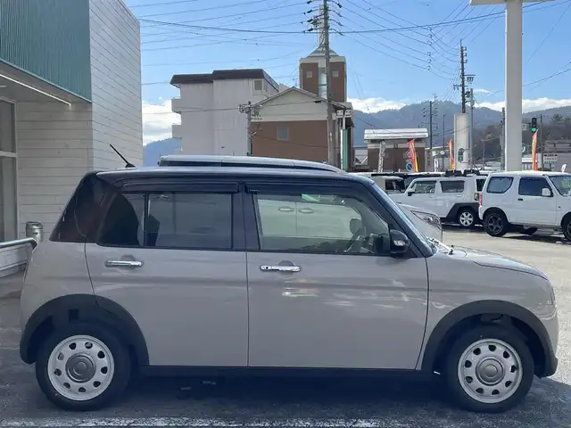 スズキ ラパン ＬＣ X 岐阜県 2025(令7)年 0.2万km フォーンベージュメタリック/アーバンブラウン 2トーン ワンオーナー/4WD/純正ディスプレイオーディオ/【Bluetooth．USB.AM/FM】/ハーフレザーシート/シートヒーター/コーナーセンサー/レーンキープアシスト/衝突被害軽減システム/バックカメラ/ドライブレコーダー/ETC/純正フロアマット/横滑り防止装置/ウィンカーミラー/ドアバイザー/スマートキー/保証書/取扱説明書/スペアキー