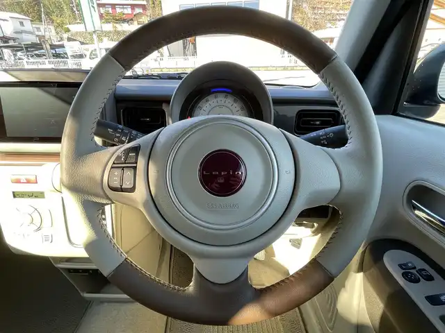 スズキ ラパン ＬＣ X 岐阜県 2025(令7)年 0.2万km フォーンベージュメタリック/アーバンブラウン 2トーン ワンオーナー/4WD/純正ディスプレイオーディオ/【Bluetooth．USB.AM/FM】/ハーフレザーシート/シートヒーター/コーナーセンサー/レーンキープアシスト/衝突被害軽減システム/バックカメラ/ドライブレコーダー/ETC/純正フロアマット/横滑り防止装置/ウィンカーミラー/ドアバイザー/スマートキー/保証書/取扱説明書/スペアキー