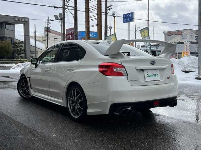 スバル ＷＲＸ ＳＴＩ STI タイプS 福井県 2015(平27)年 8.3万km クリスタルホワイトP スマートキー/プッシュスタート/６MT/LEDヘッドライト/オートライト/デュアルエアコン/HKSマフラー/HKSインテーク/ブローオフバルブ/盗難セキュリティ/STI18インチアルミ/純正フロアマット/ナビ取扱説明書有