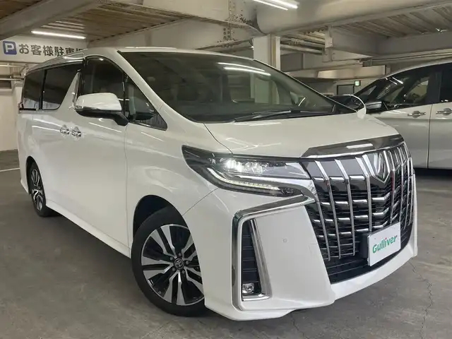 トヨタ アルファード S Cパッケージ 愛知県 2020(令2)年 2.9万km ホワイトパールクリスタルシャイン ワンオーナー/衝突被害軽減ブレーキ/レーンキープアシスト/コーナーセンサー/純正SDナビ/　(AM/FM/CD/DVD/TV/SD/Bluetooth/USB)/フルセグTV/バックカメラ/レザーシート/パワーシート/エアシート/シートヒーター/オットマン/レーダークルーズコントロール/ステアリングスイッチ/革巻きステアリング/両側パワースライドドア/パワーバックドア/LEDヘッドライト/オートハイビーム/オートライト/フォグランプ/スマートキー/スペアキー/プッシュスタート