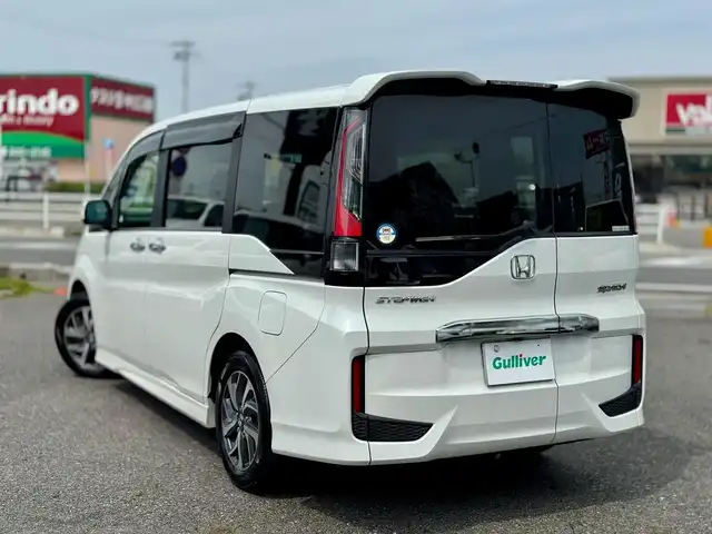 ホンダ ステップワゴン スパーダ 滋賀県 2015(平27)年 16.6万km ホワイトオーキッドパール ワンオーナー/純正9インチフルセグナビ/　フルセグ Bluetooth CD DVD SD FM AM/バックカメラ/純正フリップダウンモニター/Honda SENSING/衝突軽減ブレーキ〈CMBS〉/ACC〈アダプティブ・クルーズ・コントロール〉/LKAS〈車線維持支援システム〉/路外逸脱抑制機能/誤発進抑制機能/先行車発進お知らせ機能/標識認識機能/両側パワースライドドア/LEDヘッドライト＋オートライトコントロール付/わくわくゲート/スーパーUVカット＋IRカットフロントドアガラス/コンフォートビューパッケージ/　［親水/ヒーテッドドアミラー＋フロントドア撥水ガラス］/フロントフルオートエアコン＋リアマニュアルクーラー/1列目サイド＋サイドカーテンエアバッグシステム/純正16インチアルミ/純正フロアマット/純正ドアバイザー/ETC/スマートキー×2/プッシュスタート/1.5L DOHC VTEC TURBO/