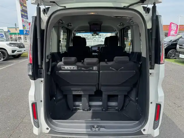 ホンダ ステップワゴン スパーダ 滋賀県 2015(平27)年 16.6万km ホワイトオーキッドパール ワンオーナー/純正9インチフルセグナビ/　フルセグ Bluetooth CD DVD SD FM AM/バックカメラ/純正フリップダウンモニター/Honda SENSING/衝突軽減ブレーキ〈CMBS〉/ACC〈アダプティブ・クルーズ・コントロール〉/LKAS〈車線維持支援システム〉/路外逸脱抑制機能/誤発進抑制機能/先行車発進お知らせ機能/標識認識機能/両側パワースライドドア/LEDヘッドライト＋オートライトコントロール付/わくわくゲート/スーパーUVカット＋IRカットフロントドアガラス/コンフォートビューパッケージ/　［親水/ヒーテッドドアミラー＋フロントドア撥水ガラス］/フロントフルオートエアコン＋リアマニュアルクーラー/1列目サイド＋サイドカーテンエアバッグシステム/純正16インチアルミ/純正フロアマット/純正ドアバイザー/ETC/スマートキー×2/プッシュスタート/1.5L DOHC VTEC TURBO/