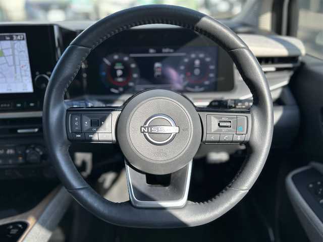 日産 オーラ G FOUR レザーエディション 東京都 2023(令5)年 1.2万km ピュアホワイトパール / スーパーブラック 2トーン ワンオーナー/純正ナビ（9インチ）/・Bluetoothオーディオ/USBオーディオ/・Apple CarPlay/AndroidAuto/フルセグTV/プロパイロット/BOSEパーソナルプラスサウンドシステム/ワイヤレス充電器/本革シート/ビルトインETC2.0/取扱説明書/保証書/スペアキー1本