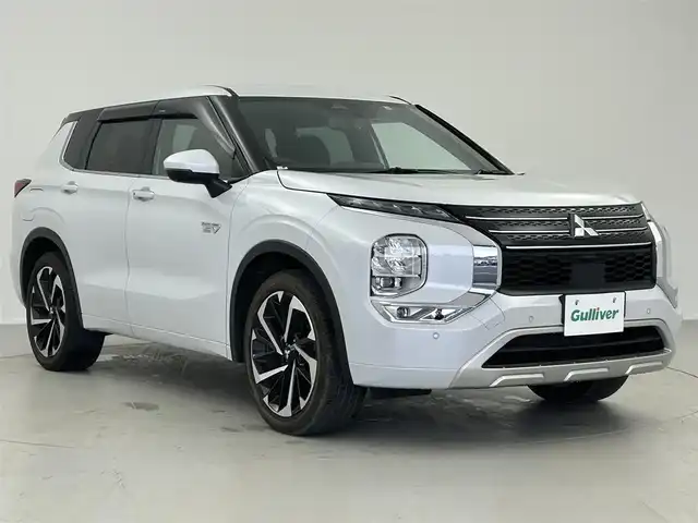 三菱 アウトランダー ＰＨＥＶ P 宮城県 2022(令4)年 3.3万km ホワイトダイヤモンド 三菱e-Assist　/BOSEサウンド　/純正メモリナビ/　　BT/フルセグ/Apple CarPlay　/マルチアラウンドモニター　/パワーバックドア /レーダークルーズコントロール /LEDオートライト /セミアニリン本革シート /シートヒーター /ブラインドスポットモニター/ヘッドアップディスプレイ/AC1500W電源/ワイヤレス充電/ ステアリングヒーター/スイッチ/純正ETC2.0/禁煙車