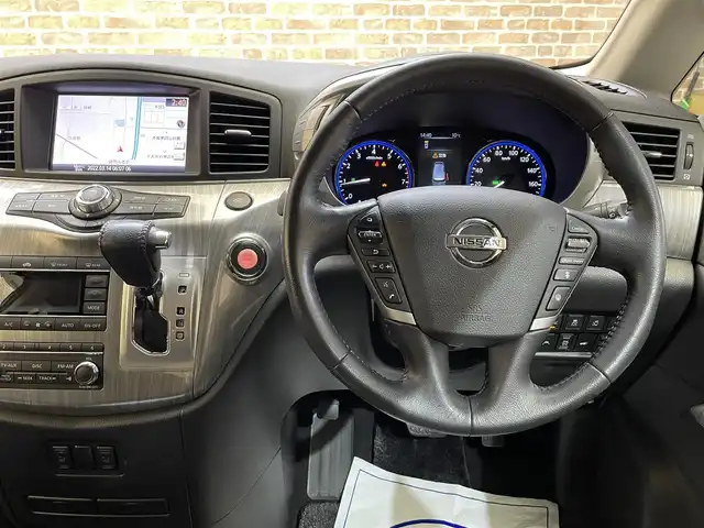 日産 エルグランド ライダー 黒本革シート 岩手県 2020(令2)年 8万km ブリリアントホワイトパール ４WD/両側パワースライドドア/レザーシート/アラウンドビューモニター/エマージェンシーブレーキ/インテリジェントクルーズコントロール/レーンアシスト/横滑り防止装置/アイドリングストップ/MTモード付AT/オートバックドア/リヤオートエアコン/パワーシート/シートヒーター/オットマン/ウォークスルー/純正ナビ/フルセグTV/ドライブレコーダー/ETC/LEDヘッドランプ/フォグランプ/純正18インチアルミホイール