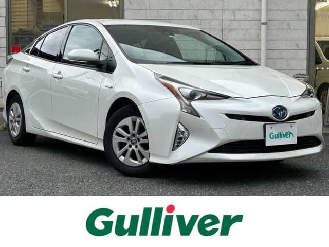トヨタ プリウス A 福岡県 2016(平28)年 2.9万km ホワイトパールクリスタルシャイン 純正メモリナビ【NSCP-W64】/　(AM/FM/CD/Bluetooth/ワンセグTV)/バックカメラ/トヨタセーフティセンス/・プリクラッシュセーフティ/・レーダークルーズコントロール/・レーンディパーチャーアラート/・オートマッチックハイビーム/ブラインドスポットモニター/シンプルインテリジェントパーキングアシスト/車両接近通報/車間距離切り替え/ヘッドアップディスプレイ/ドライブモードセレクト/ステアリングスイッチ/純正フロアマット/自動防眩ミラー/ISOFIX/スペアキー×1/保証書/取扱説明書/ナビ取扱説明書