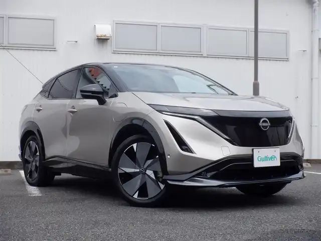 日産 アリア B9 e－4ORCE リミテッド 静岡県 2023(令5)年 3.8万km ゴールドⅡ  ワンオーナー(保証書あり）/ 4WD/ プロパイロット/ リモートパーキング用インテリジェントキーあり/ シーケンシャルウインカーミラー/ 純正ナビ/ インテリジェントアラウンドビューモニター/ インテリジェントルームミラー/ パノラミックガラスルーフ/ シートヒーター付きレザーシート/ 前席パワーシート/ ビルトインETC2.0/ パワーバックドア/ 純正ドライブレコーダー/ 純正20インチアルミ/ 純正フロアマット