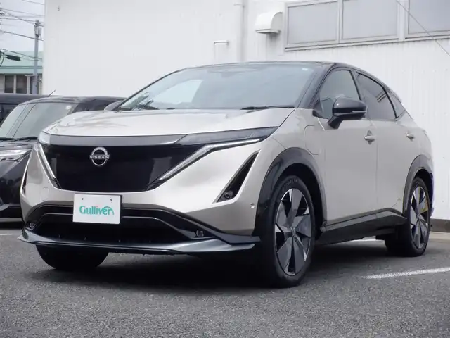 日産 アリア B9 e－4ORCE リミテッド 静岡県 2023(令5)年 3.8万km ゴールドⅡ  ワンオーナー(保証書あり）/ 4WD/ プロパイロット/ リモートパーキング用インテリジェントキーあり/ シーケンシャルウインカーミラー/ 純正ナビ/ インテリジェントアラウンドビューモニター/ インテリジェントルームミラー/ パノラミックガラスルーフ/ シートヒーター付きレザーシート/ 前席パワーシート/ ビルトインETC2.0/ パワーバックドア/ 純正ドライブレコーダー/ 純正20インチアルミ/ 純正フロアマット