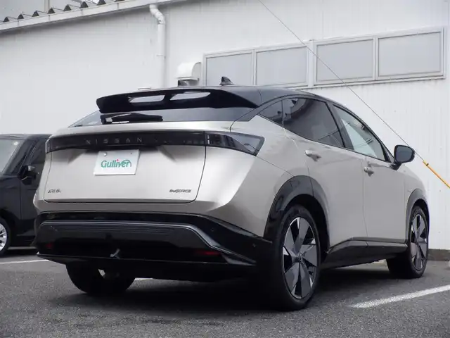 日産 アリア B9 e－4ORCE リミテッド 静岡県 2023(令5)年 3.8万km ゴールドⅡ  ワンオーナー(保証書あり）/ 4WD/ プロパイロット/ リモートパーキング用インテリジェントキーあり/ シーケンシャルウインカーミラー/ 純正ナビ/ インテリジェントアラウンドビューモニター/ インテリジェントルームミラー/ パノラミックガラスルーフ/ シートヒーター付きレザーシート/ 前席パワーシート/ ビルトインETC2.0/ パワーバックドア/ 純正ドライブレコーダー/ 純正20インチアルミ/ 純正フロアマット