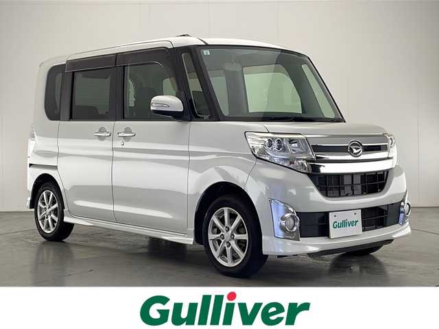 ダイハツ タント カスタム X 宮崎県 2015(平27)年 8.3万km パールホワイトⅢ 禁煙車/純正ナビTV/（NSZN-W65D/CD/DVD/Bluetooth/フルセグTV)/純正キセノンオートライト/純正フォグ/純正14インチアルミ/純正エアロ/純正ルーフエンドスポイラー/純正フロアマット/左側電動スライドドア/オートエアコン/リアプライバシーガラス/スマートキー/プッシュエンジンスタート/新車時保証書/取扱い説明書