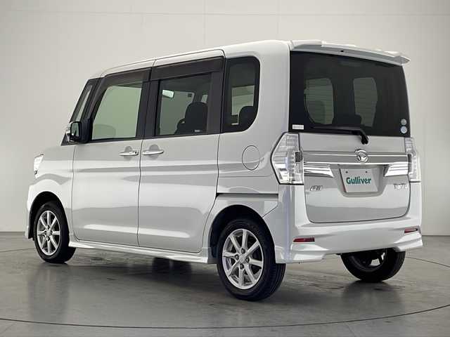 ダイハツ タント カスタム X 宮崎県 2015(平27)年 8.3万km パールホワイトⅢ 禁煙車/純正ナビTV/（NSZN-W65D/CD/DVD/Bluetooth/フルセグTV)/純正キセノンオートライト/純正フォグ/純正14インチアルミ/純正エアロ/純正ルーフエンドスポイラー/純正フロアマット/左側電動スライドドア/オートエアコン/リアプライバシーガラス/スマートキー/プッシュエンジンスタート/新車時保証書/取扱い説明書