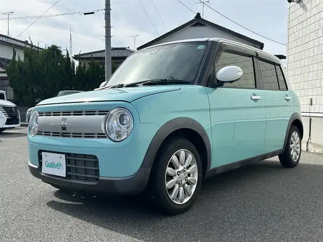 スズキ ラパン X 山形県 2018(平30)年 1.8万km フレンチミントパールメタリック 4WD/カロッツェリアSDナビ/全周囲カメラ/フルセグTV/Bluetooth/CD再生/シートヒーター/アイドリングストップ/横滑り防止装置/プッシュスタート/オートライト/オートエアコン/純正アルミ