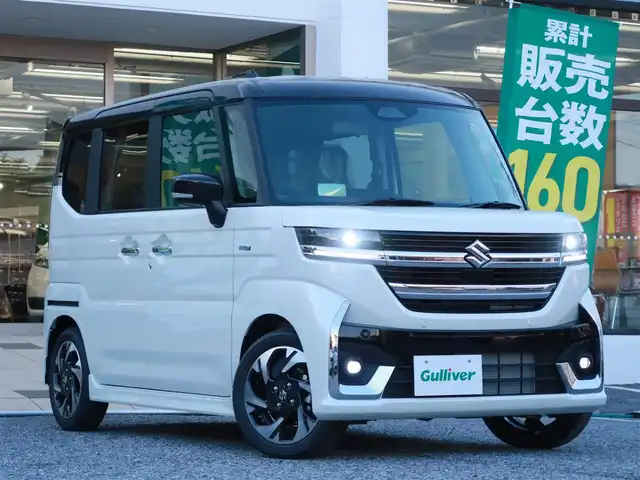 スズキ スペーシア カスタム HYBRID XS ターボ 千葉県 2025(令7)年 0.1千km ピュアホワイトパール/ブラック2トーン 【届出済未使用車】/【ピュアホワイトP/ブラック2トーン（C2H）】/ターボ車/LEDヘッドライト/LEDフォグランプ/ヘッドアップディスプレイ/スズキセーフティーサポート/両側パワースライドドア/ハーフレザーシート/シートヒーター/純正15インチAW/アダプティブクルーズコントロール/プッシュスタート/スマートキー2本/プレミアムUV/IRカットガラス/サイド/カーテンエアバッグ/保証書/取扱説明書/禁煙車　　前オーナー様の申告により表示しております。当車両の禁煙を保証するものではありません。
